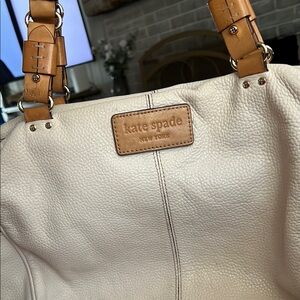 SOLD kate spade immaculate cream highest quality thick and soft leather purse.